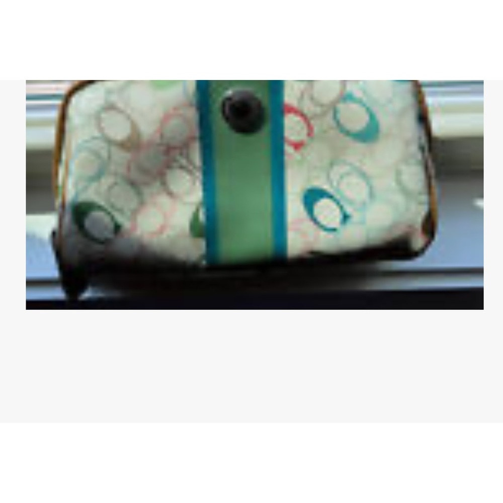 Coach multicolored cosmetic bag. Matching wristlet sold separately in my closet.
